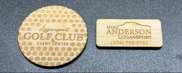 Wooden tokens laser engraved and laser cut from birch plywood
